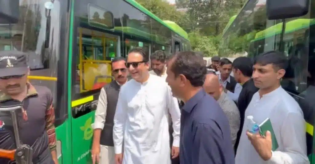 green bus in Muzaffarabad